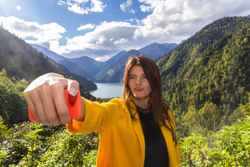 Young beautiful long hair woman making emotional selfi