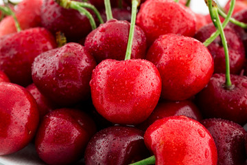 Ripe cherries close up background.