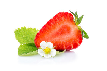 Half of strawberry with leaves and blossom.