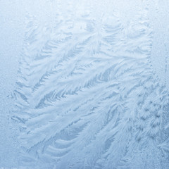 Hoarfrost. Winter background - ice crystals on window