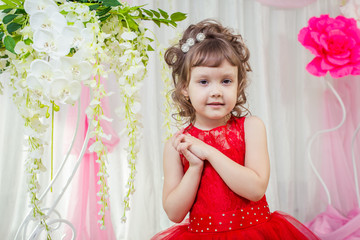 Little girl in a red dress
