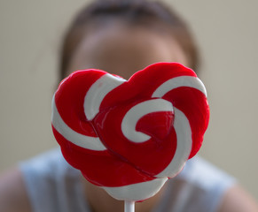 Red hart shape candy .