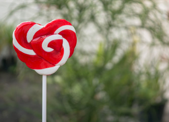 Red hart shape candy .