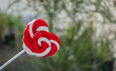 Red hart shape candy .