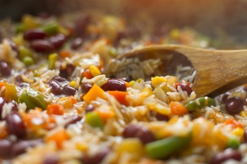 Preparing cooking vegetable paella