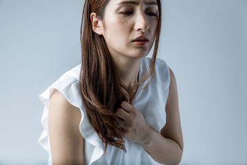 young woman having a heart ache