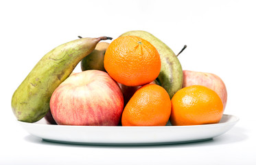 Still life of ripe fruit on a white background