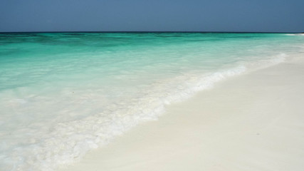 blue ocean white beach