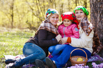 mother and the daughter in a color knitted scarf,Russian scarfs on mother and daughter