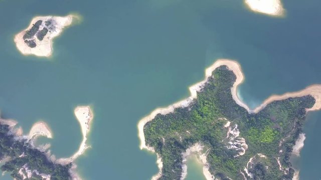 Aerial view over Hong Kong Tai Lam Chung Reservoir under smokey weather
