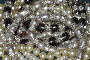 Many beautiful pearls with crystal