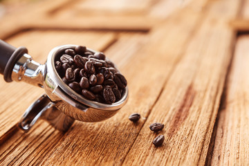 Coffee beans in the coffee maker machine.