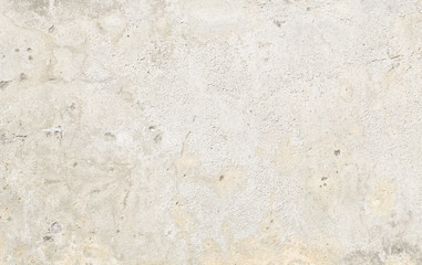 old grungy plastered wall with peeling color