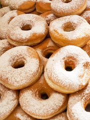 Donuts stacked on the tray