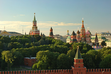 Evening view on Moscow Red Square Kremlin towers red square wall stars and Clock Kuranti Saint...
