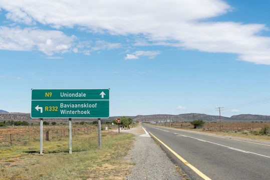 Road signs and shaded picnic spot on the N9 road