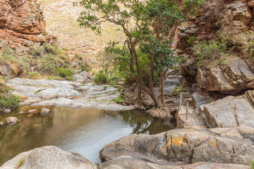 Fototapeta premium View below the waterfall in the scenic Meiringpoort