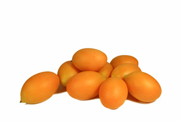 Heap of Vibrant Yellow Fresh Ripe Marian Plum or Ma-Prang Fruits Isolated on White Background  