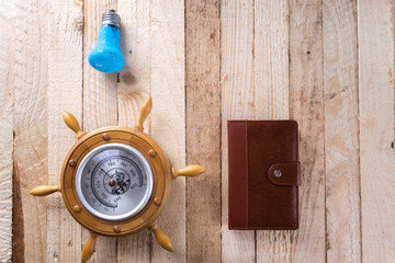 Barometer on a wooden background.