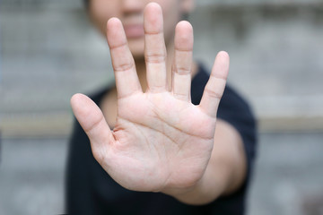 hand with stop gesture - obrazy, fototapety, plakaty