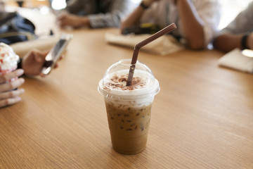 Ice coffee on wood table
