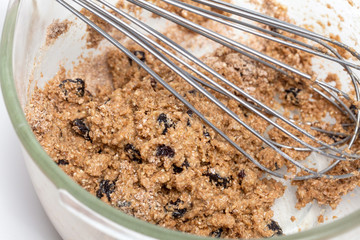 Wheat bran muffins preparation : Mixing ingredients to prepare integral wheat bran muffins