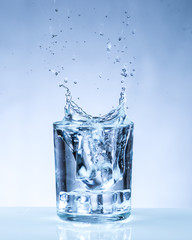ice cube into a glass of water