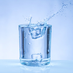 ice cube into a glass of water