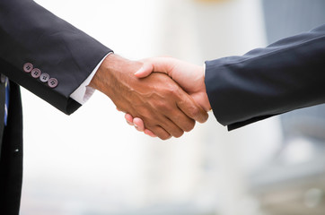 Hand shaking, business teamwork concept.