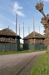 A typical haystack stocked with bales of hay in the Netherlands