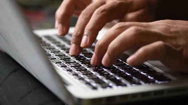  Business hand man typing on keyboard computer notebook, selective focus