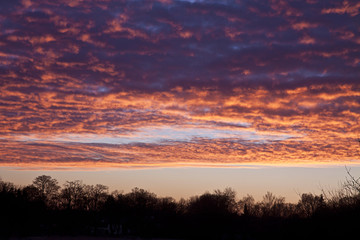 Fototapeta na wymiar cloudscape and red sunrise