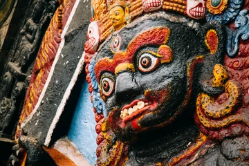 Foto auf Leinwand Closeup of the terrifyingly portrayed Bhairav in Durbar Square, Kathmandu. © raphoto