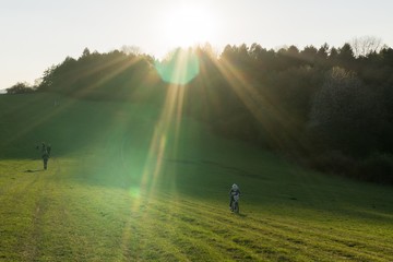 Little cyclist on a meadow. Slovakia