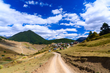 Fototapeta na wymiar View in Mountains. Road to Shenako village in Tusheti region. Georgia