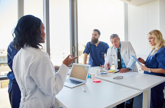 Doctor Team Meeting In The Hospital Office