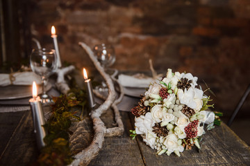 Stylish bridal bouquet on wooden table