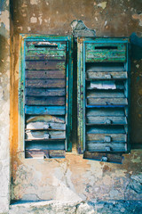 Few old mailboxes hanging on the wall. Rusted Mailboxes. Mail from the past