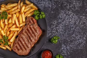 Beef barbecue steak with french fries.