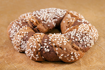 Biscuit with sesame seeds on the napkin