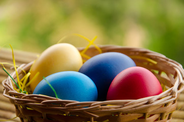 Fototapeta na wymiar Easter Eggs in Wooden basket - Orthodox Fiesta
