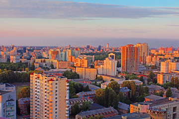 Fototapeta na wymiar Dormitory area of Kyiv city on the beautiful sunset, Ukraine