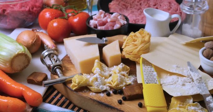 Dolly view of ingredient for bolognese sauce for lasagne, tortellini, fettuccine
