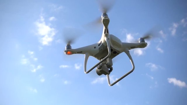 Drone flies away outdoors