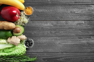 Set of healthy products on wooden background