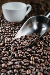 close up coffee bean and coffee cup