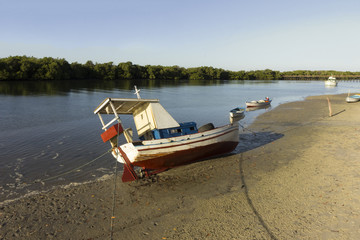 Naklejka na ściany i meble Guamaré, RN, Brazil (Fishing boats - sunset and sunshine)