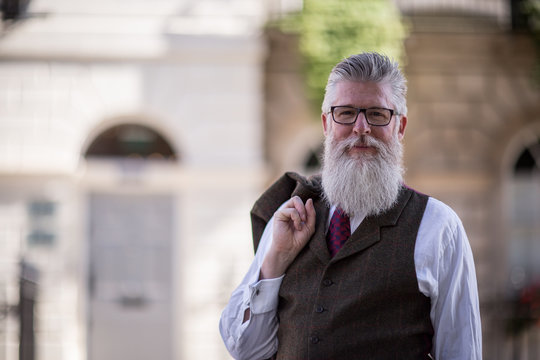 Portrait of elegant bearded man