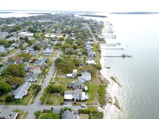 aerial view of coastal piers and town