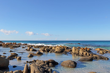 Fototapeta na wymiar Rocky beach of Friendly Beach, Tasmania, Australia